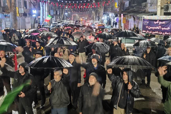 مردم شهرستان صحنه در هوای بارانی هم به میدان آمدند